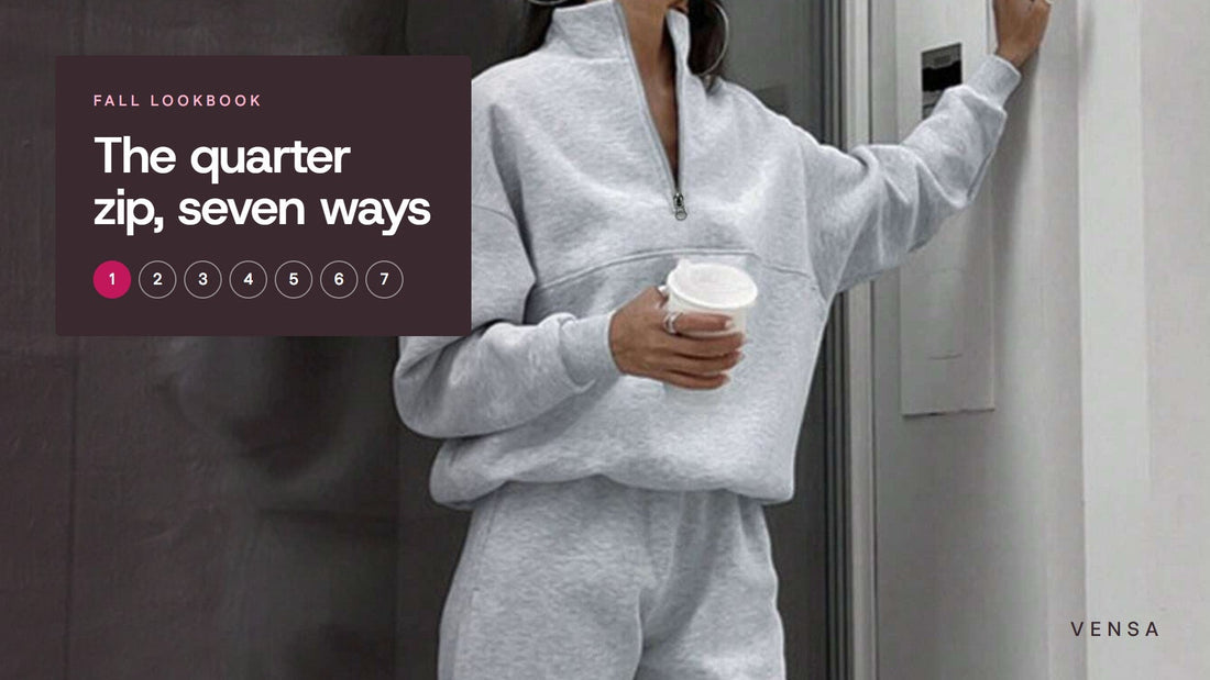 Woman in a light gray half-zip sweatshirt and matching joggers holding a coffee cup