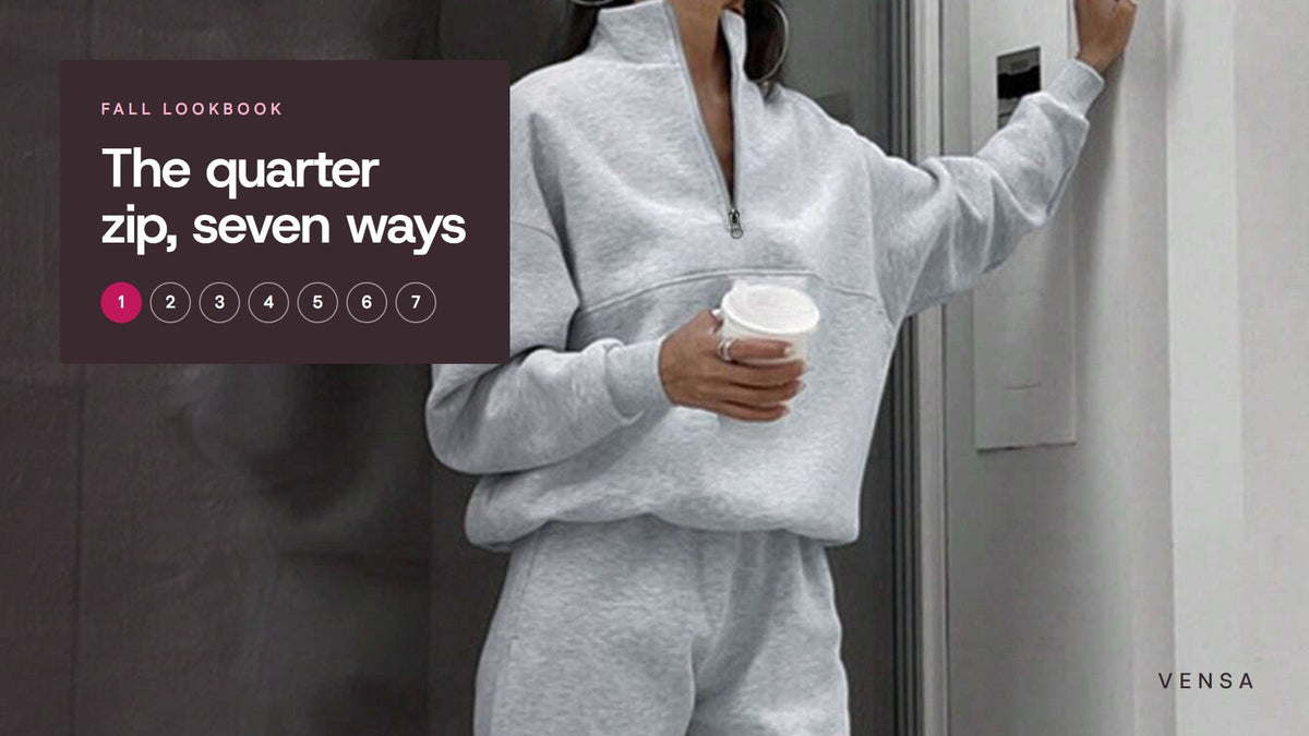 Woman in a light gray half-zip sweatshirt and matching joggers holding a coffee cup