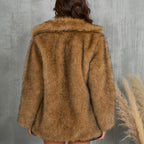 Back view of a camel shaggy faux fur coat