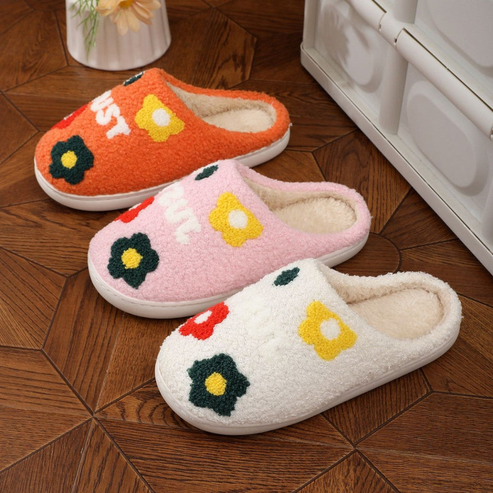 Fluffy flower plush slippers in orange, pink and white